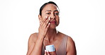 Face, woman and lotion for skincare in studio for patch test, smooth skin and facial hydration. Happy, mature person and container with cream, collagen treatment and healthy shine on white background