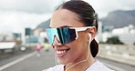 Runner, earphones and happy woman in city for exercise, workout and training for marathon. Sports, fitness and person listening to music, audio and playlist for wellness, health and running outdoor
