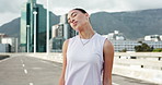 Stretching neck, runner and woman in city for exercise, marathon training and workout outdoor. Sports, fitness and person with warm up to start running for wellness, endurance and health in morning