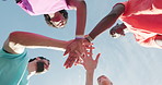 Fitness, support and hands together with people outdoor for training, team and collaboration. Running club, applause and workout partners with low angle of runner on blue sky for connection and goal