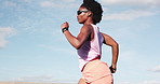 Training, running and black woman outdoor for exercise, workout or fitness for endurance marathon. Cardio, runner and person jog for practice on bridge in city with body health, wellness or challenge