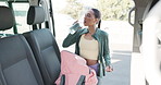 Fitness, woman and drink water for wellness by car, nutrition and recovery on break outdoor. Hydration, runner and person with bottle by vehicle in city for health, electrolytes and bag in transport