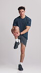 Fitness, face or man in studio with hamstring pull, muscle preparation or exercise in body activity. Sports, joint or athlete on white background with balance, workout or injury prevention in warm up