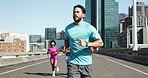Bridge, city and exercise and man runner outdoor for cardio, challenge or marathon training. Fitness, running club and workout with person on urban street for health, improvement or performance