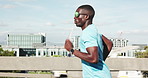 Training, running and black man in city for cardio, workout and fitness for endurance marathon. Exercise, runner and person jog for practice on bridge outdoor with body health, wellness or challenge