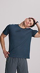 Fitness, face and man with stretching in studio for muscle tension, start workout or flexibility. Athlete, person and neck warm up exercise on white background for getting ready and stiffness relief