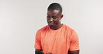Texting, athlete and man with smartphone, studio and communication with contact for workout updates. White background, mockup space and black person with mobile for message, fitness and chat on break