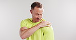 Fitness, shoulder pain and man in studio for workout  accident, exercise and training injury. Sports, mockup space and athlete with joint ache, inflammation and muscle sprain on white background