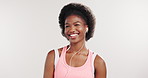 Happy, earphones and black woman in studio, exercise and wellness on white background. African person, workout and smile with sound, podcast and listening to music, playlist album or radio with audio