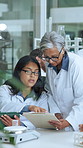 Woman, science team and tablet at laboratory for discussion, planning and medical research project. People, tech and checklist on application, insight and talk with solution for pharmaceutical study