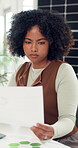Investment document, black woman or reading in office, data analysis or review financial growth for client. Chart, graph or analyst with digital trend research, performance report or asset management