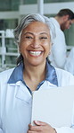 Mature woman, scientist and face at laboratory with clipboard, happy or confident for medical research. Person, smile and excited in portrait for pharmaceutical study, project or pride with checklist
