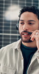 Man, talk and headset with solar panel at call centre for consultation, customer service and feedback. Agent, discussion and help with renewable energy, PV troubleshooting and online advice for query