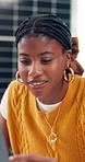 Creative, black woman and reading with laptop in office for research, planning and solar panel. Female person, pc and review report for renewable energy, project feedback and photovoltaic information