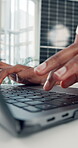 Hands, person and typing with laptop in office for research, grid planning and solar panel. Closeup, employee and pc to email client of renewable energy, project feedback and photovoltaic information