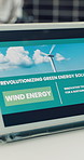 Tablet screen, sustainability and wind energy at office for display, innovation or eco friendly startup. Tech, ui and website for clean power, renewable electricity or windmill with video at agency