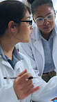 Research, blood sample and writing with women in lab for dna analysis, vaccine test and clinical trial. Virus investigation, antigen study and medical collaboration with scientist in clinic for cure