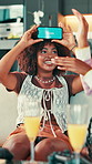 Friends, girl and phone with guess game on sofa for challenge, funny description or ostrich answer. Action, people or laugh with smartphone screen in home for contest, animal clue or social gathering