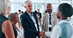 Business people, handshake and meeting in seminar, introduction and discussion at global convention. Shaking hands, collaboration and agreement or greeting at conference, welcome and b2b thank you
