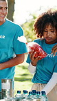 Packing, volunteer group and food drive at park with grocery supplies, nonprofit project or charity. NGO team, people and help with donation package outdoor for community outreach or humanitarian aid