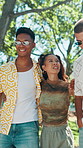 Friends, happy and people in park walking for bonding on holiday, vacation and weekend outdoor. Relax, fashion and man with women for connection, conversation and embrace for social hangout together