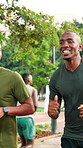 Fitness, running and men in park for exercise, marathon training and workout outdoors. Runner, sports and happy friends with pace for practice, endurance and challenge for wellness, cardio and health