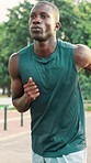 Athlete, fitness and man with running at park for pace training, endurance challenge and health. Runner, black person and jog in nature for marathon practice, sports performance and wellness workout