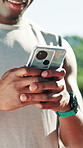 Hands, fitness and man with phone in nature for health app, typing text or internet notification. Mobile, athlete and person outdoor for online communication, exercise schedule or track performance