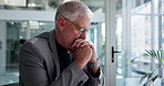 Thinking, CEO and man with glasses, office and planning for investment proposal, online and research. Serious, boss and mature person with laptop for funding opportunity, reflection and corporate