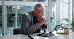 Glasses, laptop and mature businessman think in office for vision, reading email or financial report. Computer, spectacles or serious advisor with research, investment insight and eyesight correction