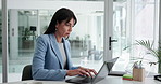 Business woman, thinking and typing on laptop for bookkeeping, tax compliance and solution. Accountant, employee and tech at accounting firm for auditing review, wealth management and report analysis