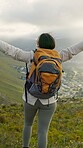 Hiking, freedom and back with woman on mountain for view, success and trekking achievement. Adventure, backpacking goals and winner with person and open arms in nature for  target, outdoor and travel