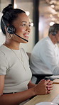 Woman, headset and talk at call center, computer and smile at night with contact for lead generation job. People, consultant and agent with mic, solution or happy with sales in dark office at company