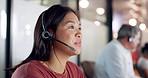 Woman, conversation and customer service with headset for call center, crm and support in office. Consultant, tech and advice agency with operator, problem solving and bokeh and night for discussion
