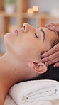 Hands, facial massage and woman in spa for beauty, skincare and holistic cosmetics with peace. Health, masseuse and face treatment in resort for luxury therapy, dermatology and relax with bokeh