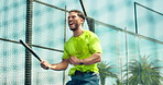 Winner, excited and padel with man on court for fitness, energy and game competition goal. Success, tennis player achievement and low angle with person outdoor for sports club, contest and target