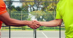 Fitness, handshake and padel with men on court together for congratulations, respect or thank you. Competition, exercise and sports with people shaking hands outdoor for event, game or tournament