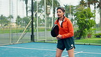 Padel tennis, woman and waiting with serve on court for fitness, training and performance. Game, cardio workout or club competition with team in match for athlete, exercise and racket tournament