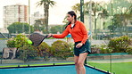 Padel tennis, woman and start with serve on court for fitness, training and performance. Game, cardio workout or club competition with person in match for athlete, exercise and racket tournament
