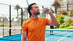 Happy man, fitness and drinking water with bottle in padel court for hydration, recovery or rest. Thirsty, male person or mineral liquid with beverage for natural sustainability, sport or break