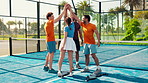 Happy people, team and high five with applause on padel court for game, sportsmanship or unity. Group, players or clapping in celebration with trust or solidarity for sport, match or fitness together