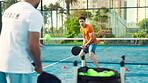 Padel, sport and coach with man, court and practice for challenge, wellness and training for fitness. Active, tennis player and people with rackets for skill development, energy and tournament