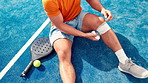 Bandage, knee pain and man with padel injury for court, medical crisis and accident outdoors. Fitness, health and person with ache, strain and hurt from training, workout and exercise for tennis game