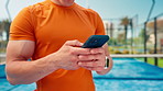 Man, hands and sport with phone in padel court for sport app, fitness or schedule match. Active, male person or fitness user with mobile smartphone for online network, training tips or health guide