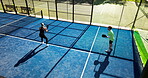 Playing, padel and team with rackets, court and training for challenge with energy, active or cardio. Outdoor, tennis players and people with equipment for tournament, above and practice for fitness