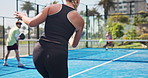 Padel court, serve and woman with fitness, sports game and challenge with technique. People, tennis players and healthy with skills, competition and tournament with contest, training and hit ball