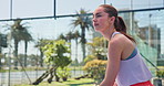 Padel, serve and woman on court for practice, exercise and training for competition, match and game. Sports, fitness and athlete with equipment outdoor for hobby, workout and challenge for tournament