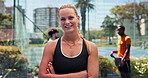 Padel court, face and woman with arms crossed, smile and recreation with sports game. Tennis players, outdoor or healthy person with pride, tournament or training with practice, fitness and athlete
