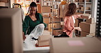 Women, boxes and packaging team at dropshipping startup, stock or inventory management with fashion. People, partner and small business owner with plastic wrap, logistics or collaboration at workshop