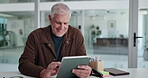 Funny, tablet and thinking with business man in office for reaction to feedback or good news. App, laughing and reading with mature employee in workplace for planning, project management or research